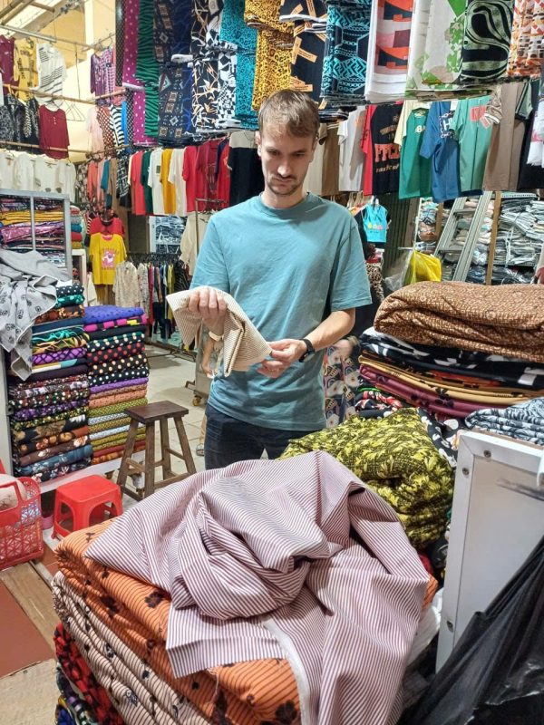 Seeking fabrics at the market