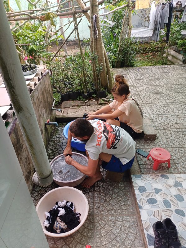 Washing clothes by the canal